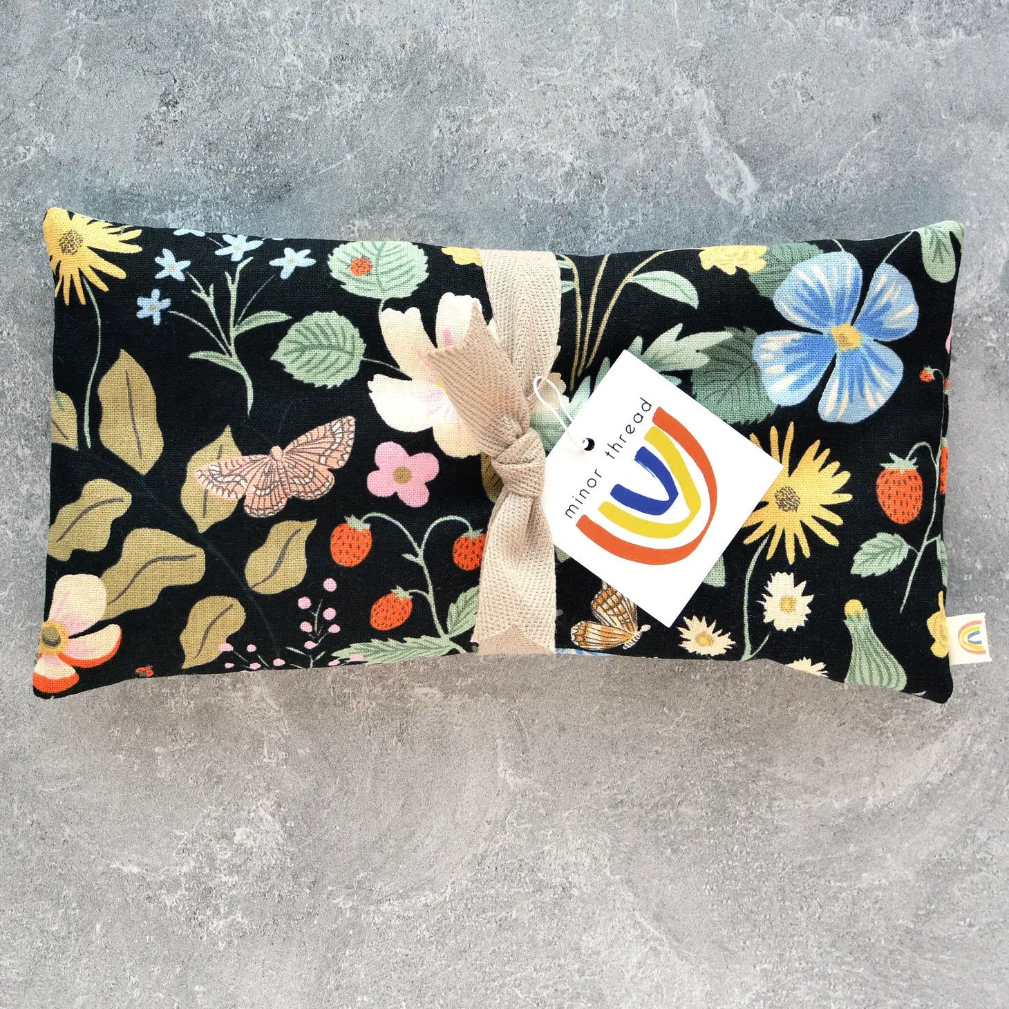 Minor Thread Oversized Eye Pillow In Strawberry Fields Floral In Black - Lavender available at The Good Life Boutique