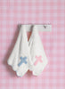 Mud Pie Blue Chenille Cross Blanket available at The Good Life Boutique