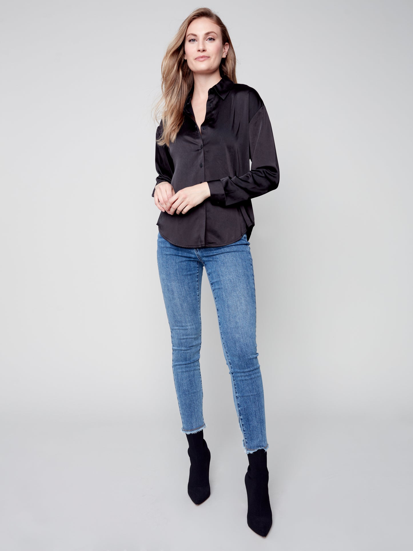 Charlie B Charlie B - Solid Satin Button Front Shirt With Shirttail Hem - Black available at The Good Life Boutique