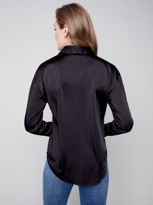 Charlie B Charlie B - Solid Satin Button Front Shirt With Shirttail Hem - Black available at The Good Life Boutique
