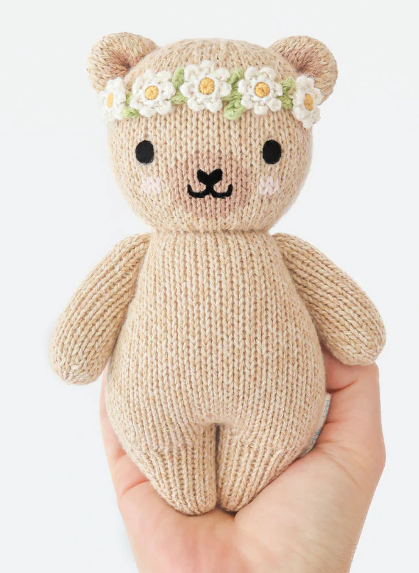 Cuddle&Kind Cuddle + Kind Baby Honey Bear - Ivory Floral available at The Good Life Boutique