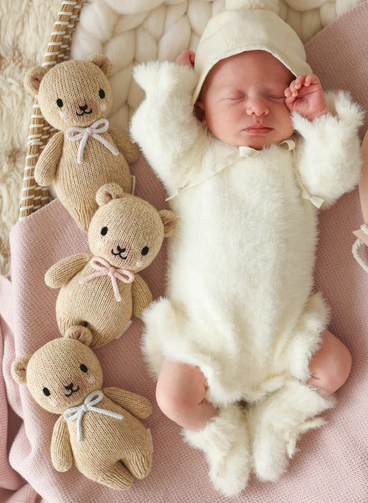Cuddle&Kind Cuddle + Kind Baby Honey Bear - Blush Bow available at The Good Life Boutique
