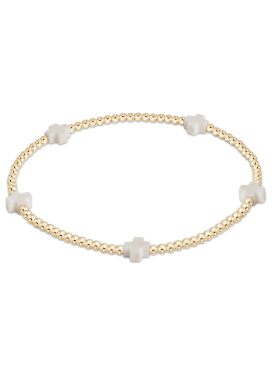 enewton design EGIRL Signature Cross Small Gold Pattern 2mm Bead Bracelet - Off-White available at The Good Life Boutique