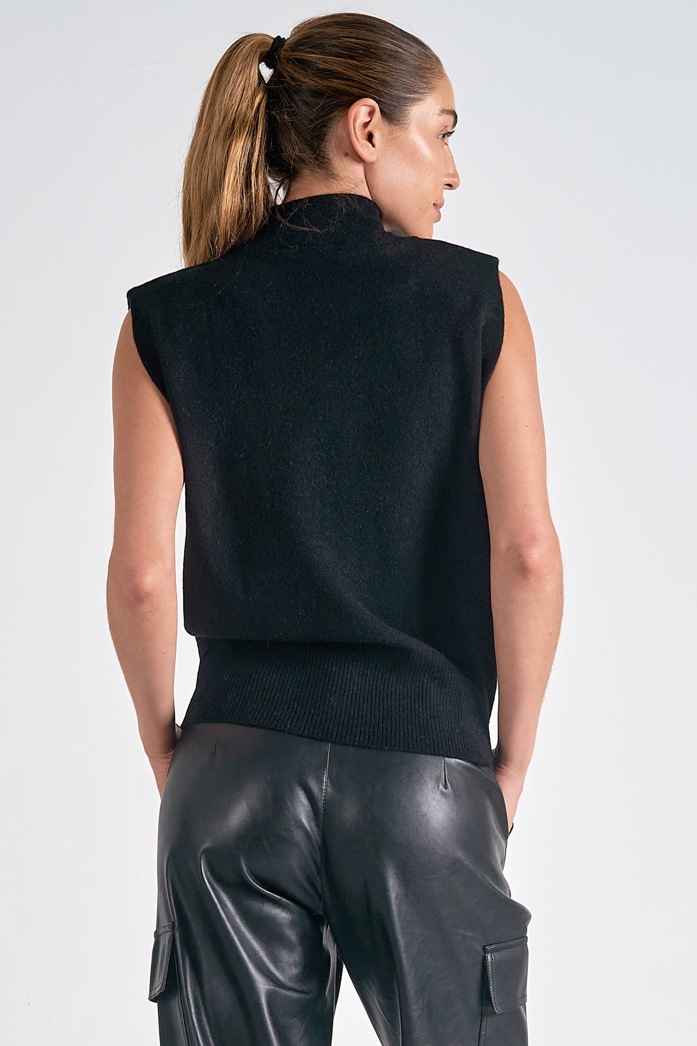 Elan Elan - 8 Sleeveless Sweater - Black available at The Good Life Boutique