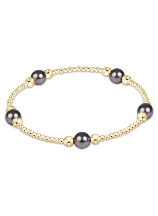enewton design Enewton-Purpose Pearl Dark Grey 6mm Gold Bracelet available at The Good Life Boutique