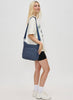 Sol & Selene Sol & Selene - Kismet - Woven Neoprene Crossbody - Dark Denim available at The Good Life Boutique