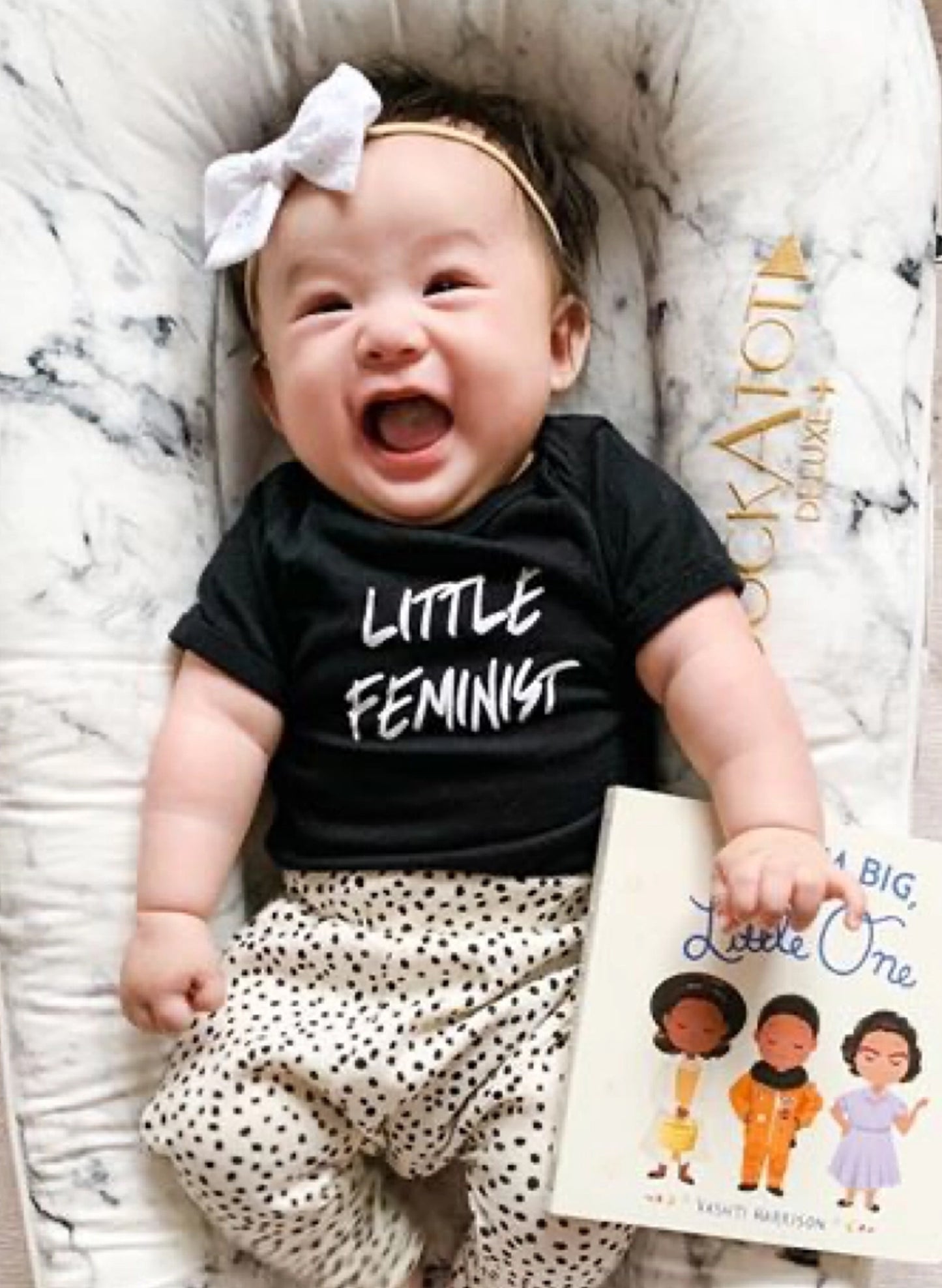 Love Bubby Little Feminist Short Sleeve Black Baby Bodysuit available at The Good Life Boutique