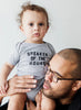 Love Bubby Speaker Of The House Short Sleeve Grey Baby Bodysuit available at The Good Life Boutique