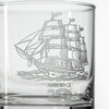 Clear glass rocks glass with etched tall ship design and America 250 logo