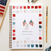 Americana Watercolor Workbook by Emily Lex Studio with paint swatches and American flag design