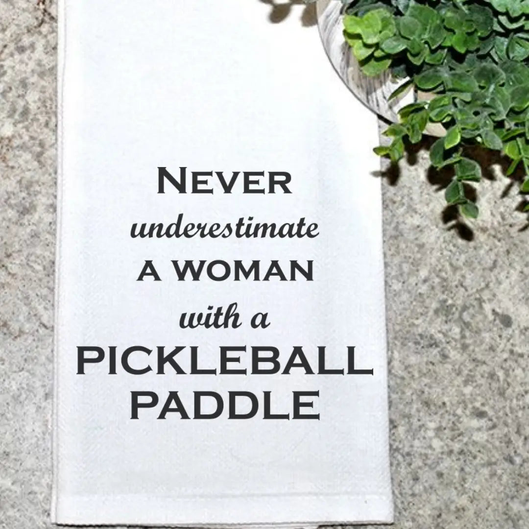 Geez Louise Goods Never Underestimate A Woman With A Pickleball Paddle available at The Good Life Boutique