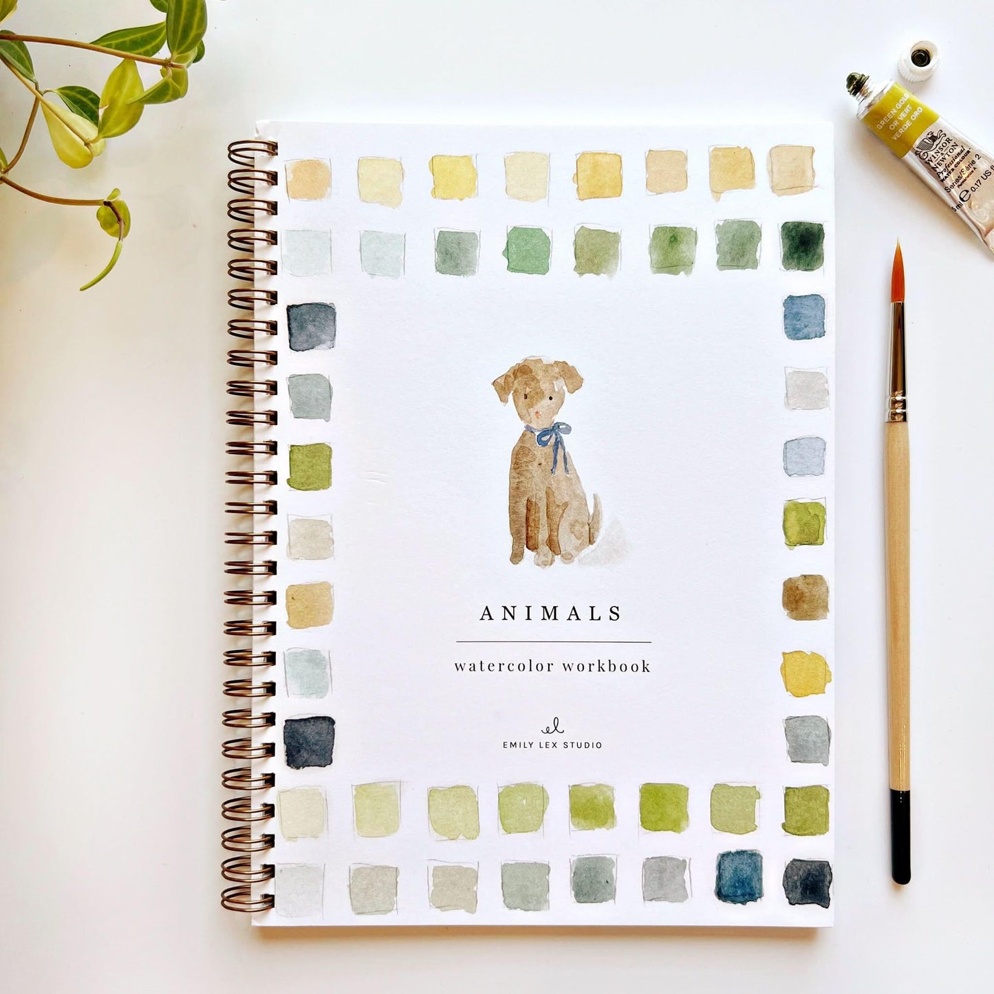 Animals watercolor workbook by Emily Lex Studio with painted dog illustration and color swatches