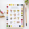 Bouquets Watercolor Workbook by Emily Lex Studio with color swatches and floral illustrations