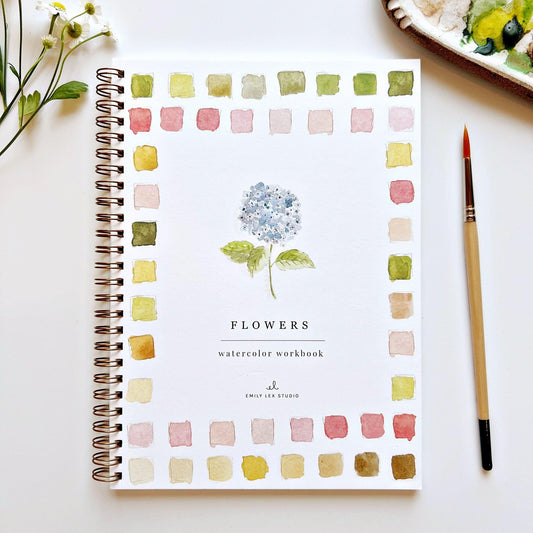 Flowers Watercolor Workbook by Emily Lex Studio with color swatches and paintbrush