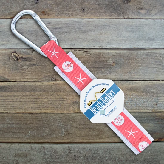 Beach Badger Sand Dollar Beach Badge Holder available at The Good Life Boutique