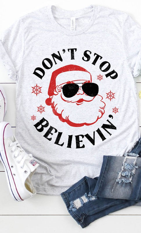 Kissed Apparel Don't Stop Believin' Santa Graphic Tee available at The Good Life Boutique