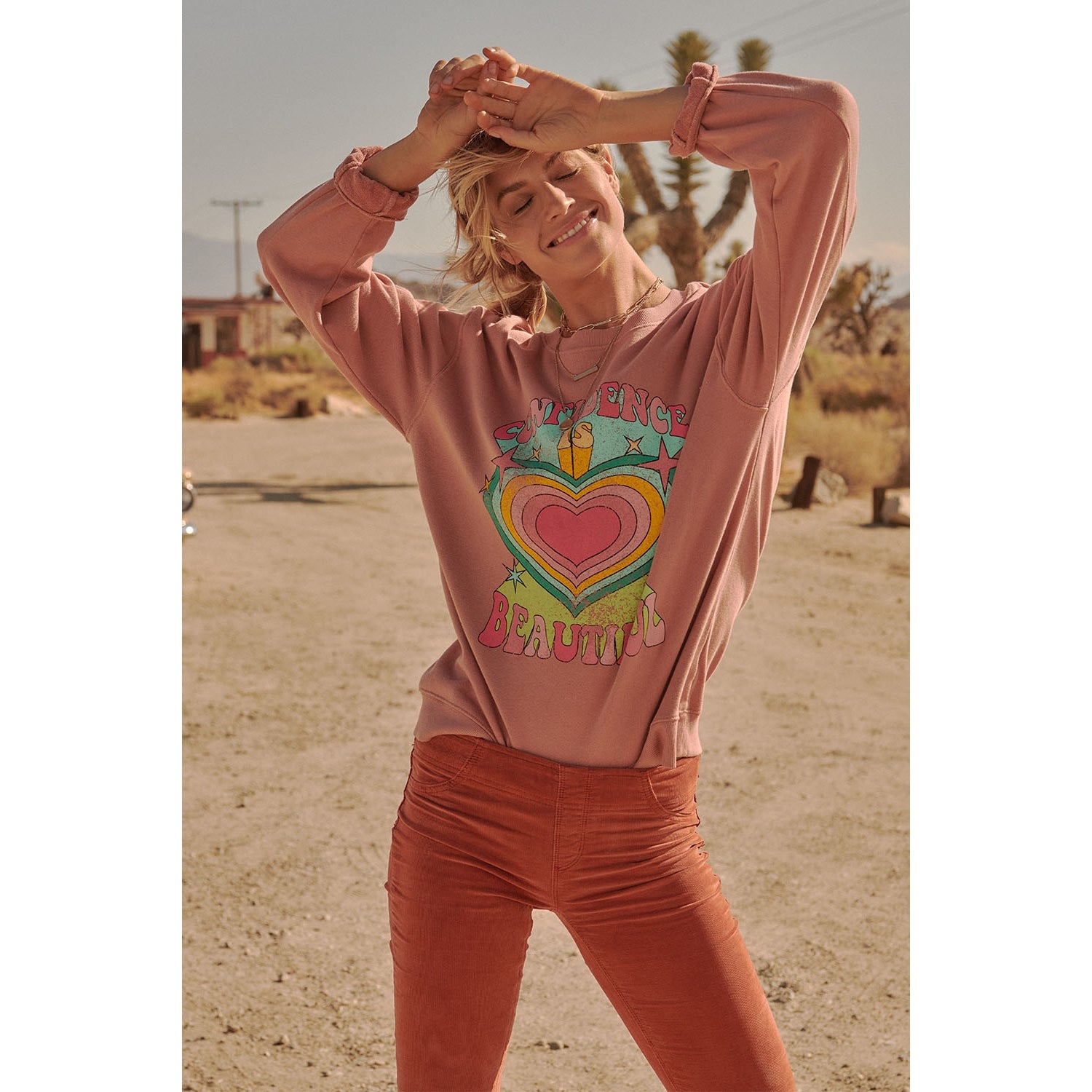 Promesa Confidence Is Beautiful Vintage Graphic Sweatshirt available at The Good Life Boutique